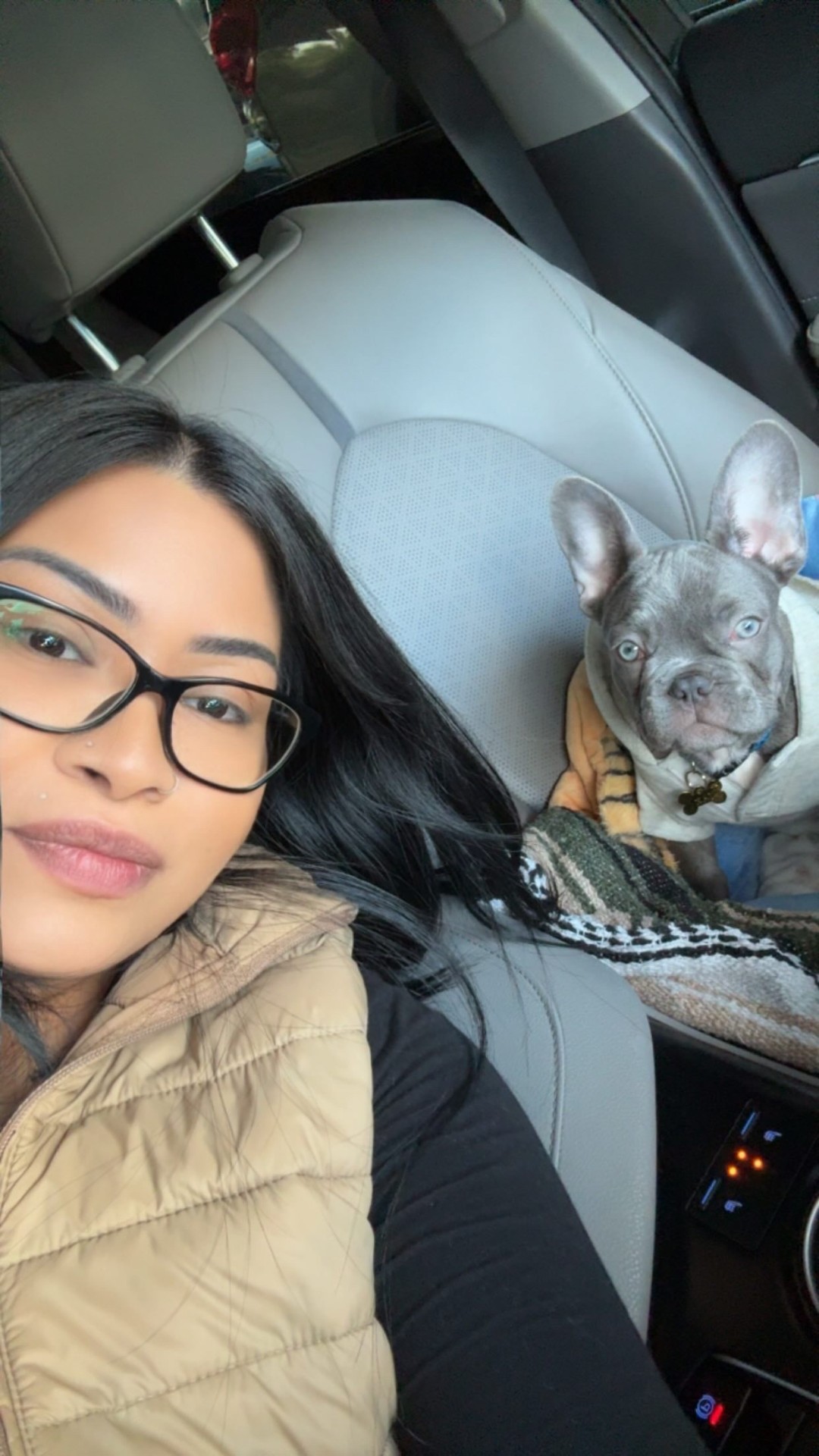 A happy family member with her blue French Bulldog, Jax.